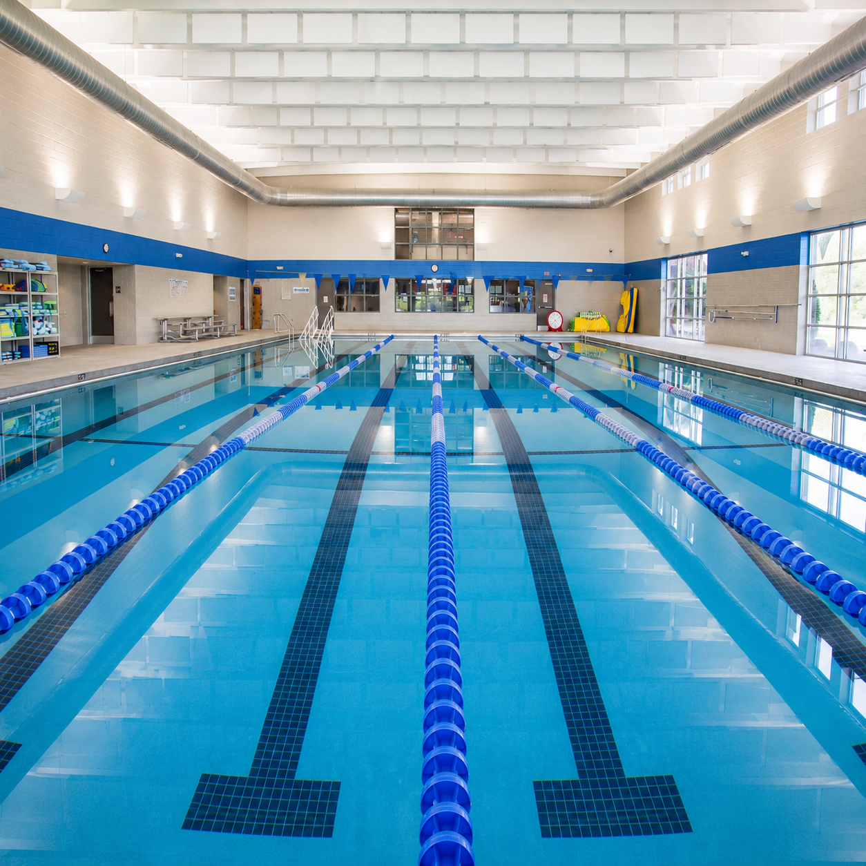 Linear Ceiling Baffles Over Pool
